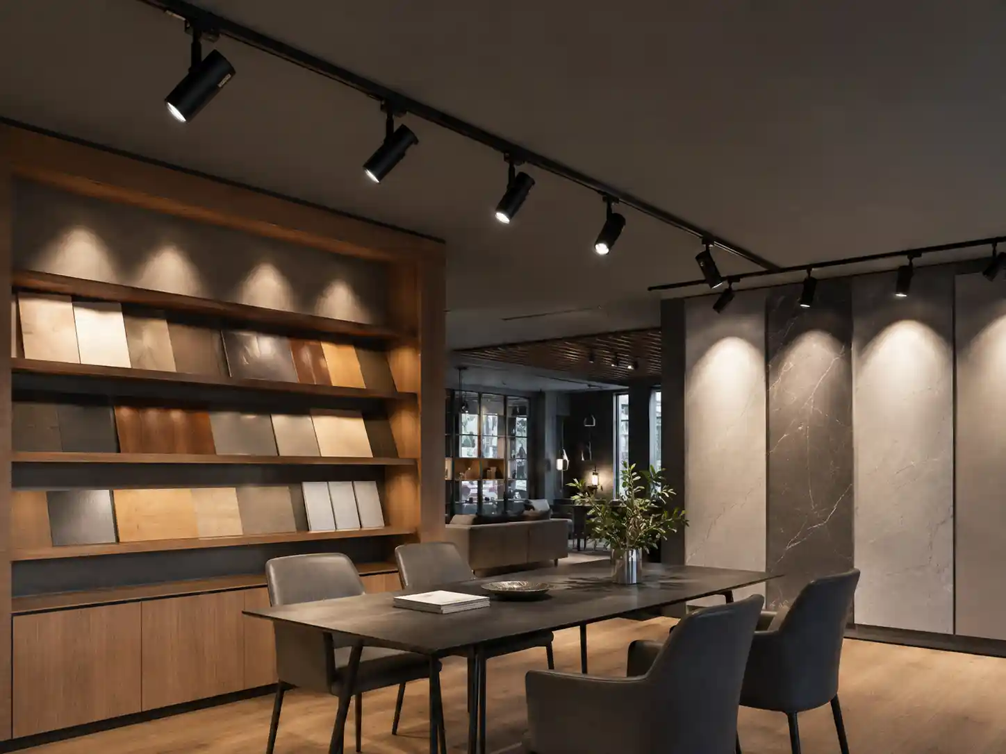 Contemporary interior with adjustable track lights for display and workspace lighting